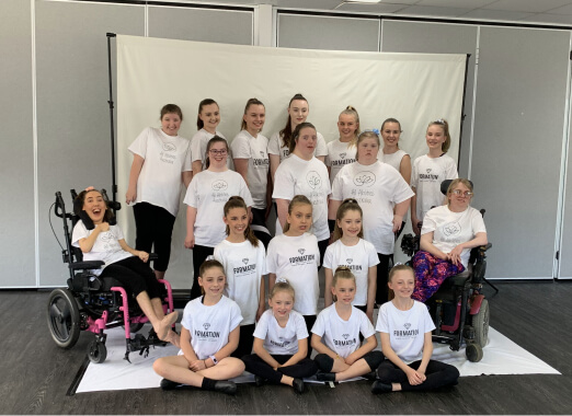 A group of All Abilities Australia students and their friends from Formation Dance are proudly showing off how inclusion is easy!